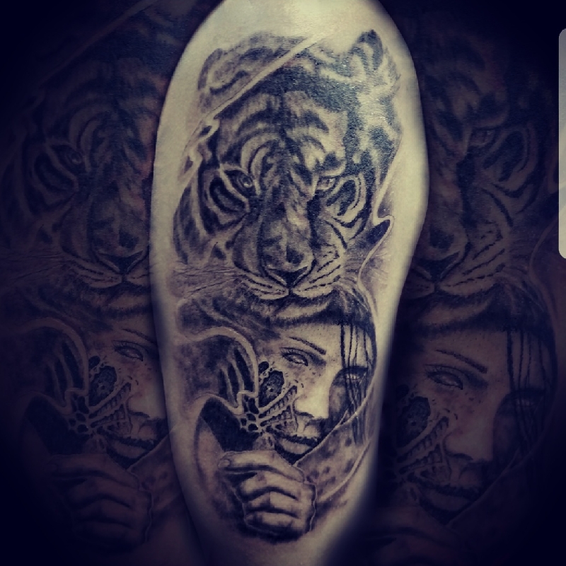 Tiger with lady face tat by Anthony Sinclair aka Tuna 